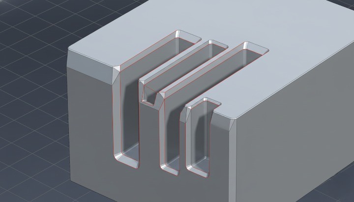 3D CAD part with color-highlighted CNC machining risks such as deep pockets and sharp internal corners