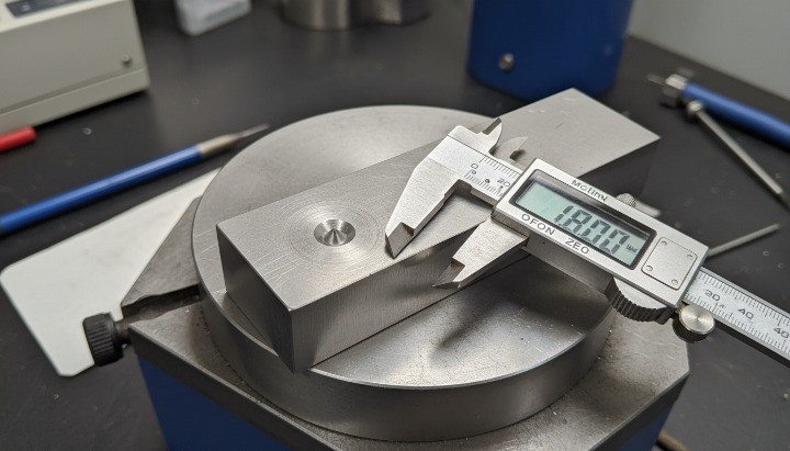 metal hardness testing indentation on steel coupon for CNC quality control