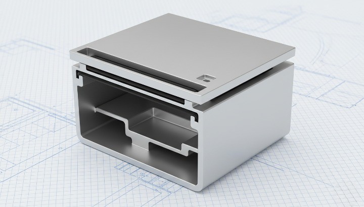 CNC milled enclosure with sealing groove and gasket land showing controlled lid fit for sealing.